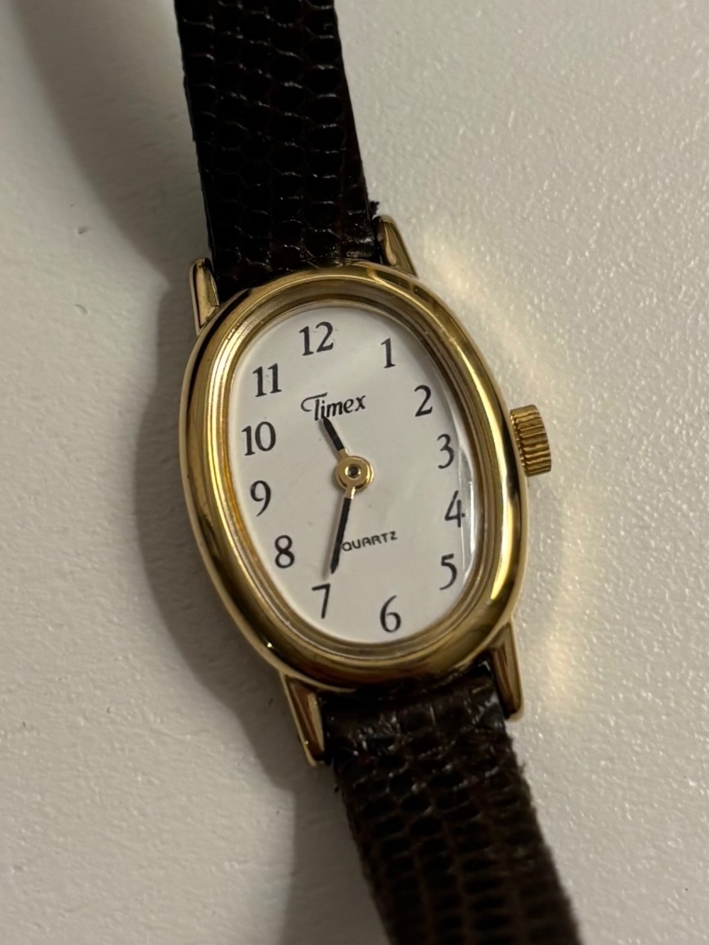 Timex Women’s Oval Gold Tone Quartz Watch – Faux Leather Band – Not Working